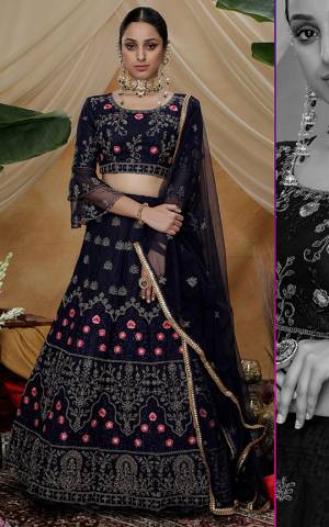 You Will Definitely Earn Lots Of Compliments Wearing This Heavy Designer Lehenga Choli In Navy Blue Color. Its Blouse, Lehenga And Dupatta Are Fabricated On Net Beautified With Attractive Embroidery Work. 