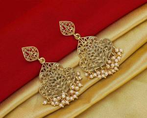 Here Is A Pretty Elegant Looking Heavy Designer Pair Of Earrings In Golden Color Beautified With Pearl Work. You Can Pair This Up With Any Colored Traditional Attire. 