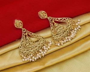 Here Is A Pretty Elegant Looking Heavy Designer Pair Of Earrings In Golden Color Beautified With Pearl Work. You Can Pair This Up With Any Colored Traditional Attire. 