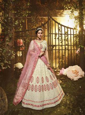 Grab This Very Beautiful Heavy Designer Lehenga Choli In Off-White color Paired With Baby Pink Colored Dupatta. This Pretty Heavy Embroidered Lehenga Choli Are Fabricated On Georgette Paired With Net Fabricated Dupatta. Buy This Pretty Piece Now.