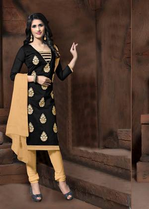 Simple Dress Material Is Here In Black Colored Top Paired With Cream Colored Bottom and Dupatta. Its Top Is Modal Silk Based Paired With Cotton Bottom And Chiffon Fabricated Dupatta. It Top Is Beautified With Thread Embroidery Work. 