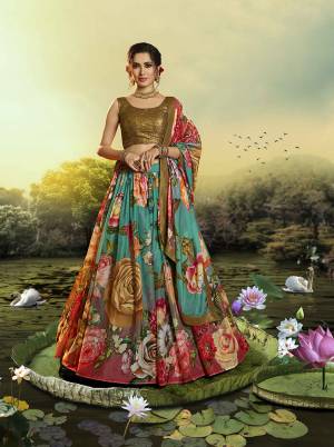 Celebrate This Festive And Wedding Season Wearing This Trendy Designer Lehenga Choli In Sequence Embroidered Copper Colored Blouse Paired With Multi Colored Lehenga And Dupatta Which Is Beautified With Pretty Floral Prints. 