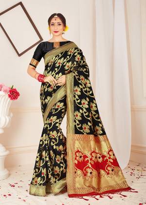 Add This Pretty Designer Saree to Your Wardribe In Black Color. This Saree And Blouse Are Fabricated On Banarasi Art Silk Beautified With Bold And Attractive Weave. Its Lovely Floral Pattern And Rich FabricWill Earn You Lots Of Compliments From Onlookers. 