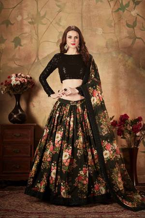 Get Ready For The Upcoming Wedding Season With This Beautiful Designer Lehenga Choli In Black Color. Its Pretty Embroidred Blouse Is Fabricated On Georgette Paired with Orgenza Fabricated Printed Lehenga and Dupatta. 