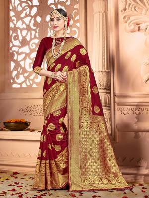 Shine Bright Wearing This Pretty Designer Maroon Colored Heavy?Weaved Saree. This Saree And Blouse Are Fabricated On Banarasi Art Silk Beautified With Weave All Over. It Is Suitable For Upcoming Wedding And Festive Season. Buy Now.