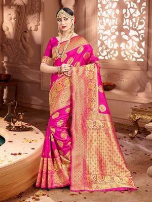 Shine Bright Wearing This Pretty Designer Rani Pink Colored Heavy?Weaved Saree. This Saree And Blouse Are Fabricated On Banarasi Art Silk Beautified With Weave All Over. It Is Suitable For Upcoming Wedding And Festive Season. Buy Now.