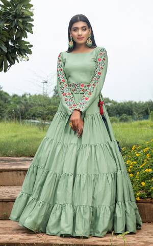 Grab This Designer Floor Length Gown In Light Green Color Fabricated On Cotton. This Pretty Gown Is Beautified With Prints, Also It Is Light In Weight And Easy To Carry All Day Long. 