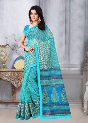 Simple and Elegant Looking Printed Saree Is Here For Your Casual Or Semi-Casual Wear. This Saree and Blouse Are Fabricated On Kota Silk Beautified With Prints All Over. It Is Light In Weight and Easy To Carry All Day Long. 