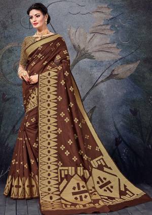 Here Is A Pretty Rich Designer Weaved Saree In Brown Color. This Saree And Blouse Are Fabricated On Handloom Cotton Which Is Durable And Easy To Care For. 