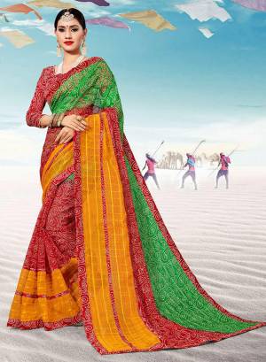 Pretty Simple Saree For Your Casual Or Semi-Casual Wear Is Here In Red And Green Color. This Saree And Blouse Are Fabricated On Kota Silk Beautified With Prints All Over. 