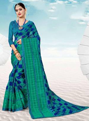 Pretty Simple Saree For Your Casual Or Semi-Casual Wear Is Here In Sea Green And Royal Blue Color. This Saree And Blouse Are Fabricated On Kota Silk Beautified With Prints All Over. 